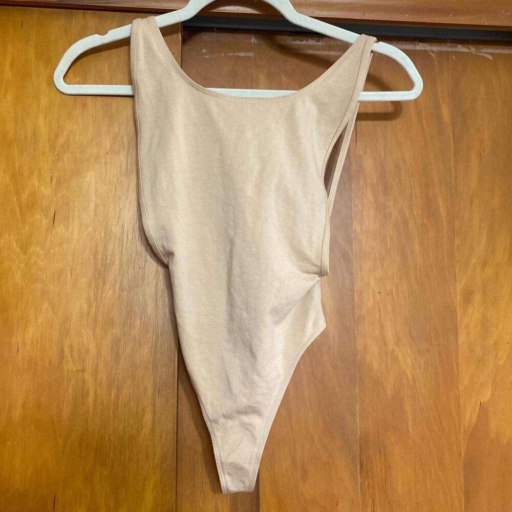 NWT American Apparel Tan Nude bodysuit with scoop neck and open sides & back.